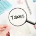 magnifying-glass-word-tax-form-1040 - Pratama Institute