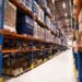 interior-large-distribution-warehouse-with-shelves-stacked-with-palettes-goods-ready-market - Pratama Institute vendor