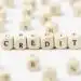 credit-written-scrabble-letters-high-view - Pratama Institute kredit