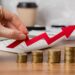 hand-holding-growth-arrow-with-coins - Pratama Institute investasi