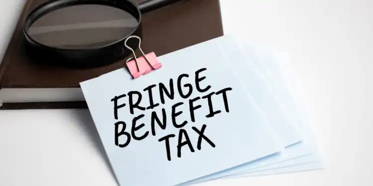 magnifying-glass-with-fringe-benefit-tax-sign-paper-sheet - Pratama Institute pajak natura