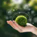Hand of human holding green earth ESG icon for Environment Social and Governance, World sustainable environment concept.