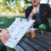 group-asian-business-people-with-strong-teamwork-outdoor-office-gyre_31965-446537 - Pratama Institute Memahami Perbedaan Standar Assurance Laporan Keberlanjutan