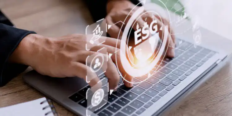 Businessman using a computer for analysis ESG environmental soci - Pratama Institute #image_title