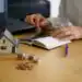 closeup-shot-person-thinking-buying-selling-house 1 - Pratama Institute #image_title