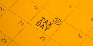 Calendar page highlighting TAX DAY on the 15th with a circled 15 mark in a yellow page theme.